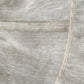 Asymmetrical hemline and finishing detail on linen skirt