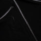 Close-up of black velvet fabric arranged in soft folds, showing its smooth surface and subtle sheen.