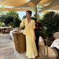 Butter yellow linen co-ord styled for a summer vacation.