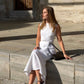 White linen peplum top and flowing bias cut skirt set