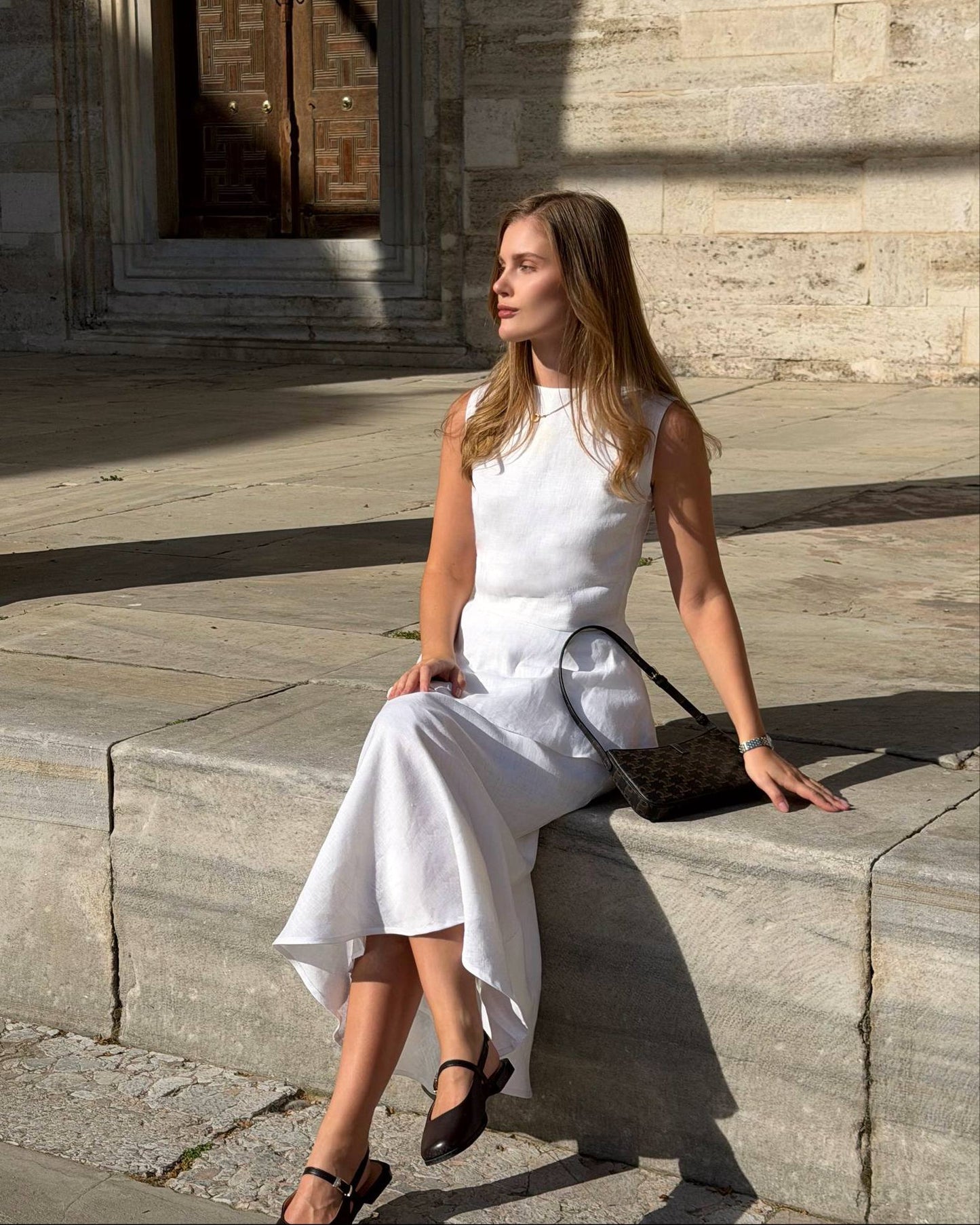 White linen peplum top and flowing bias cut skirt set