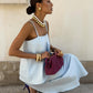 Soft blue linen camisole top with flowing maxi skirt