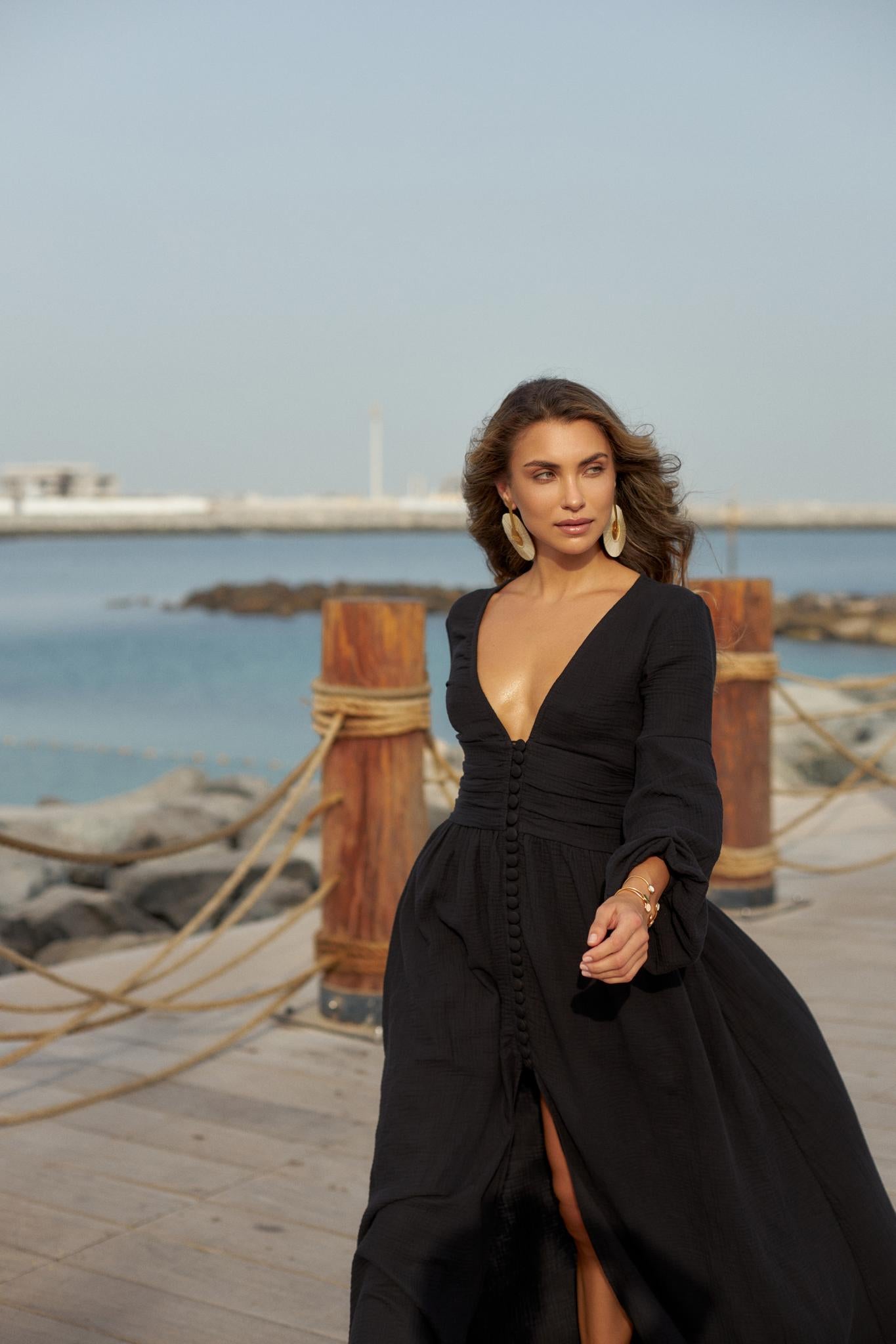 Plunged black muslin maxi dress