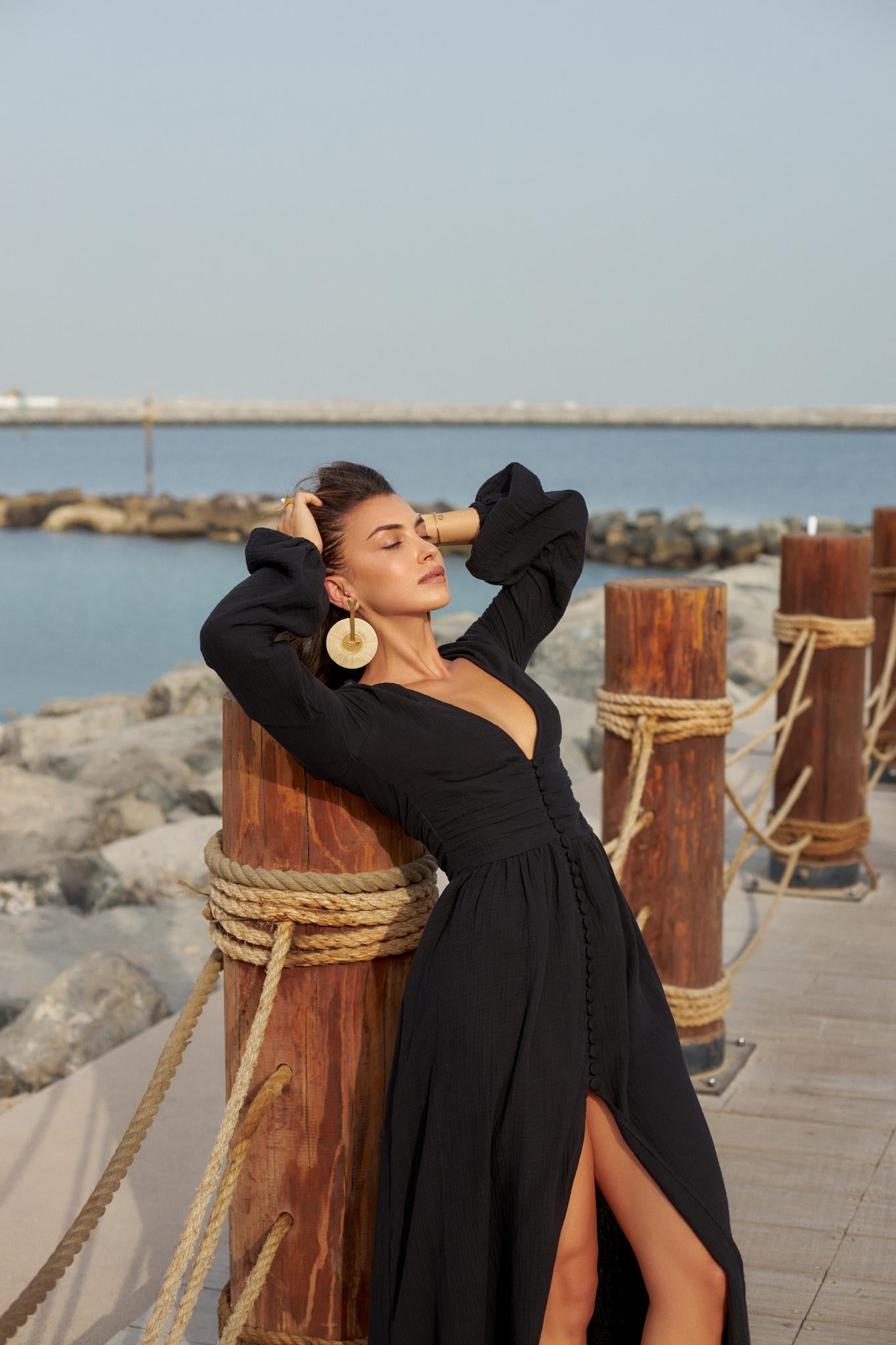 Plunged black muslin maxi dress