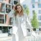  women in Natural linen blazer and slip dress