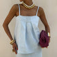 Light blue linen two piece outfit with flowing maxi skirt