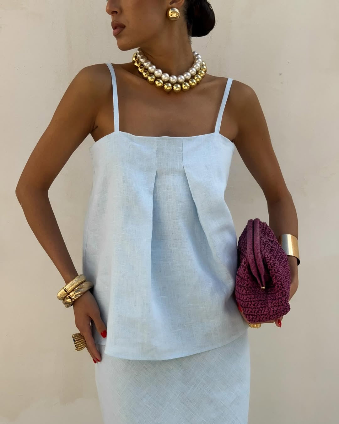 Light blue linen two piece outfit with flowing maxi skirt