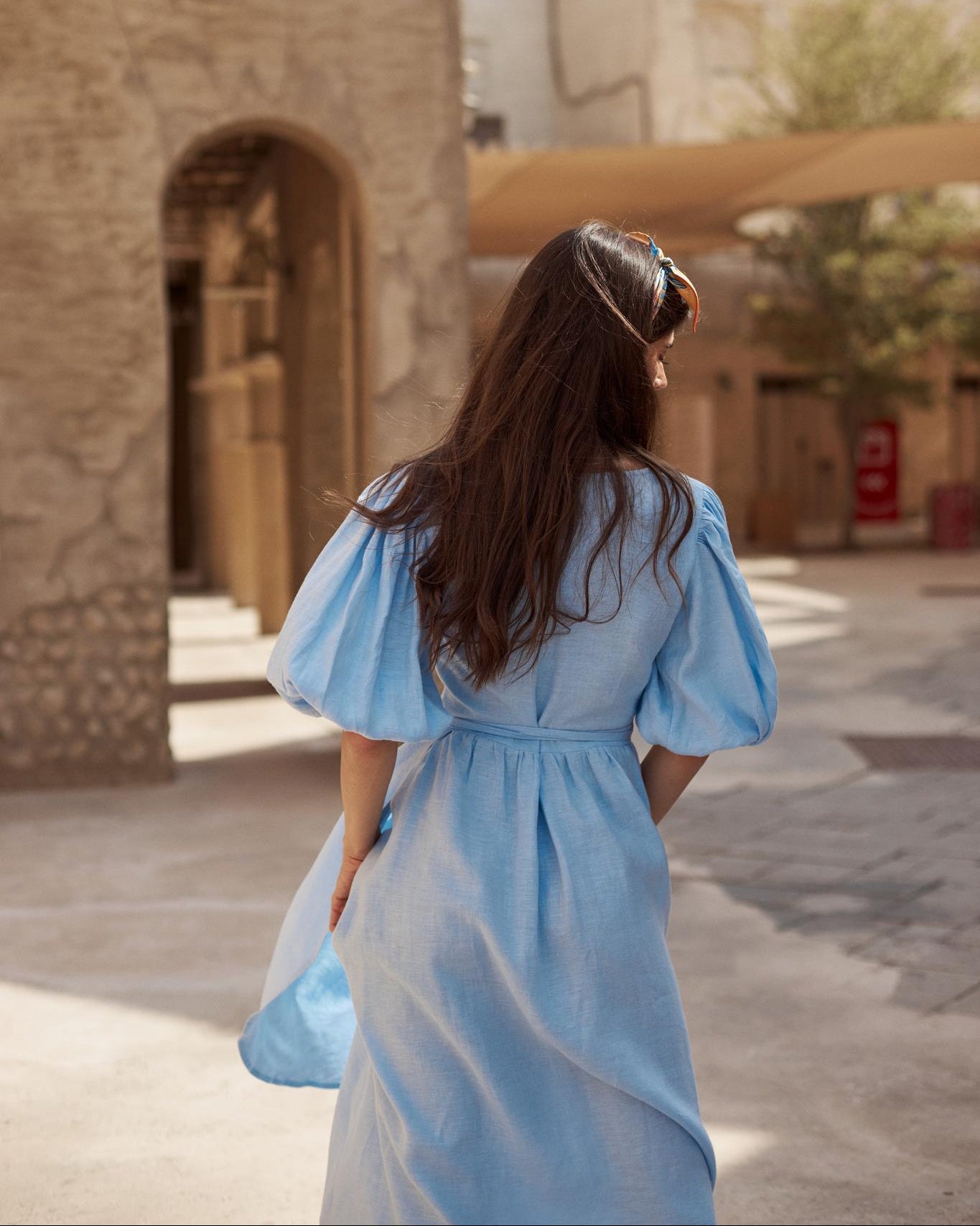 Midi linen dress  in sky blue back side 