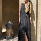 Black linen wrap maxi dress styled with a silk scarf.