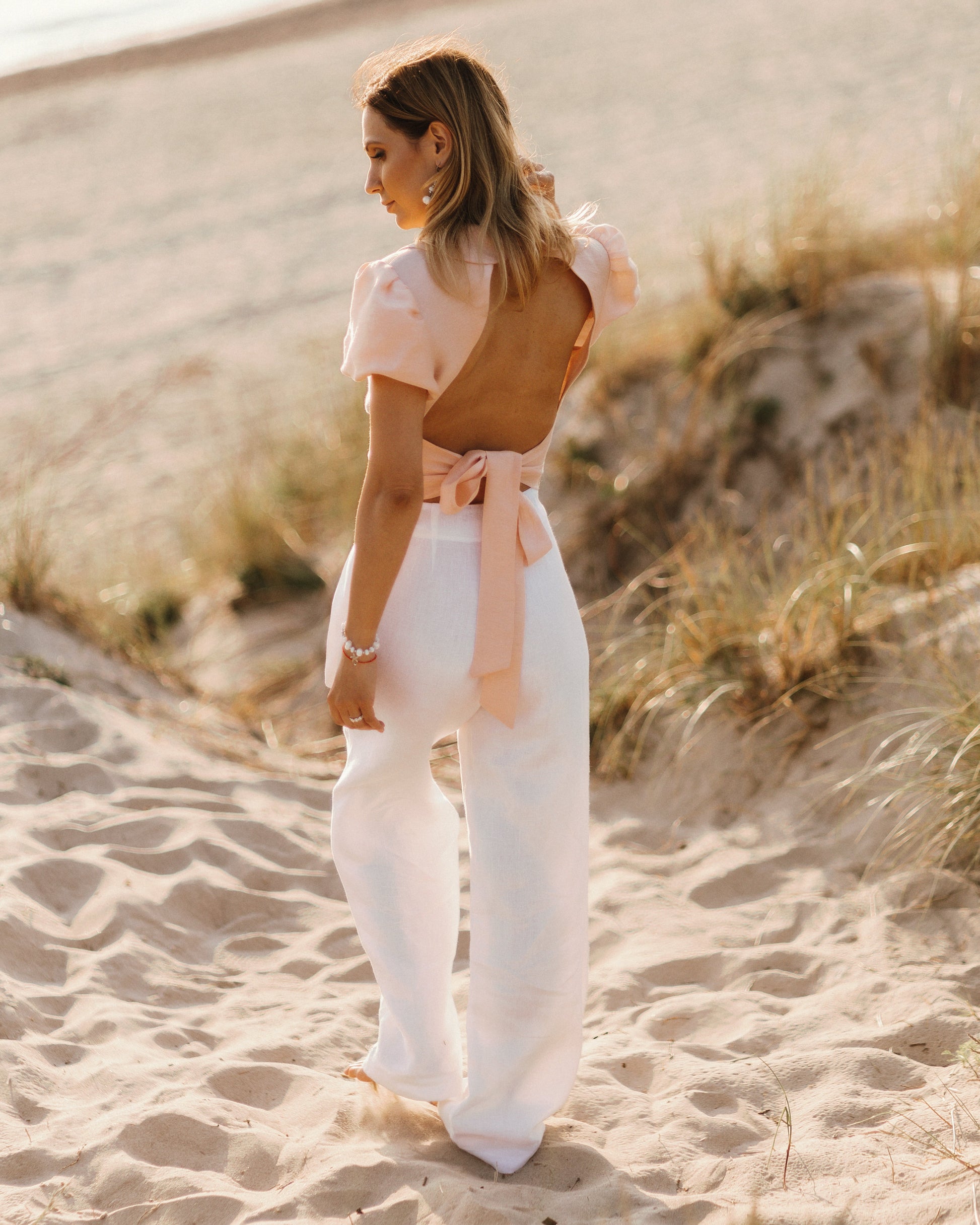 Soft pink linen backless blouse with open back