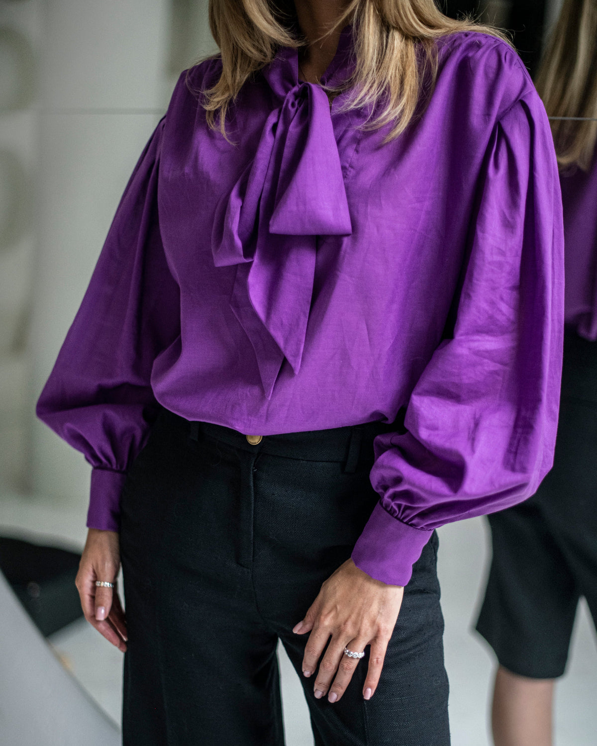 Purple cotton blouse with a dramatic ascot bow, draped shoulders and voluminous balloon sleeves