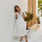White linen wrap midi dress with puff sleeves for summer