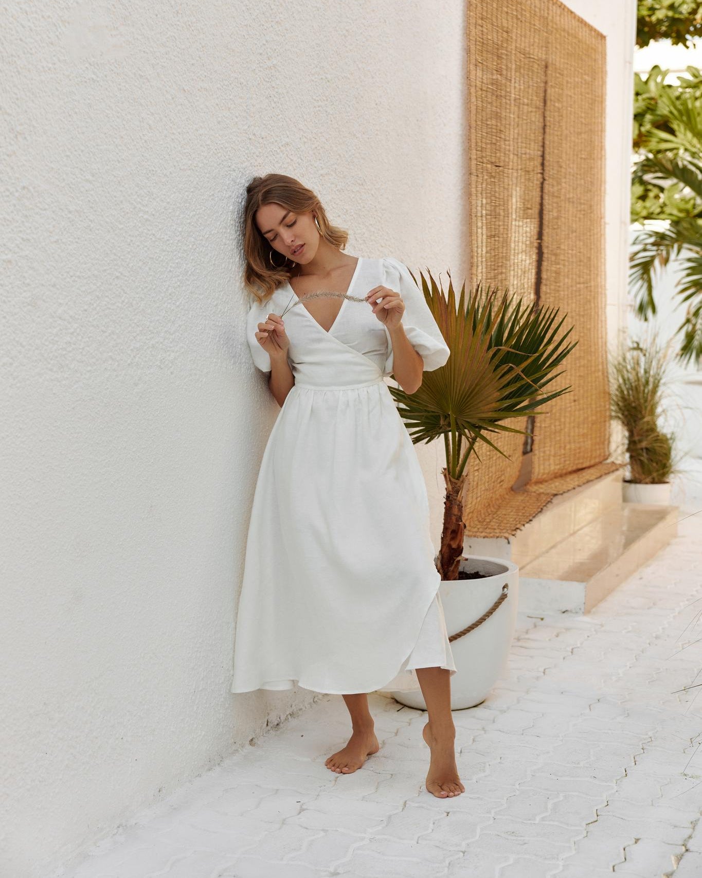 White linen wrap midi dress with puff sleeves for summer
